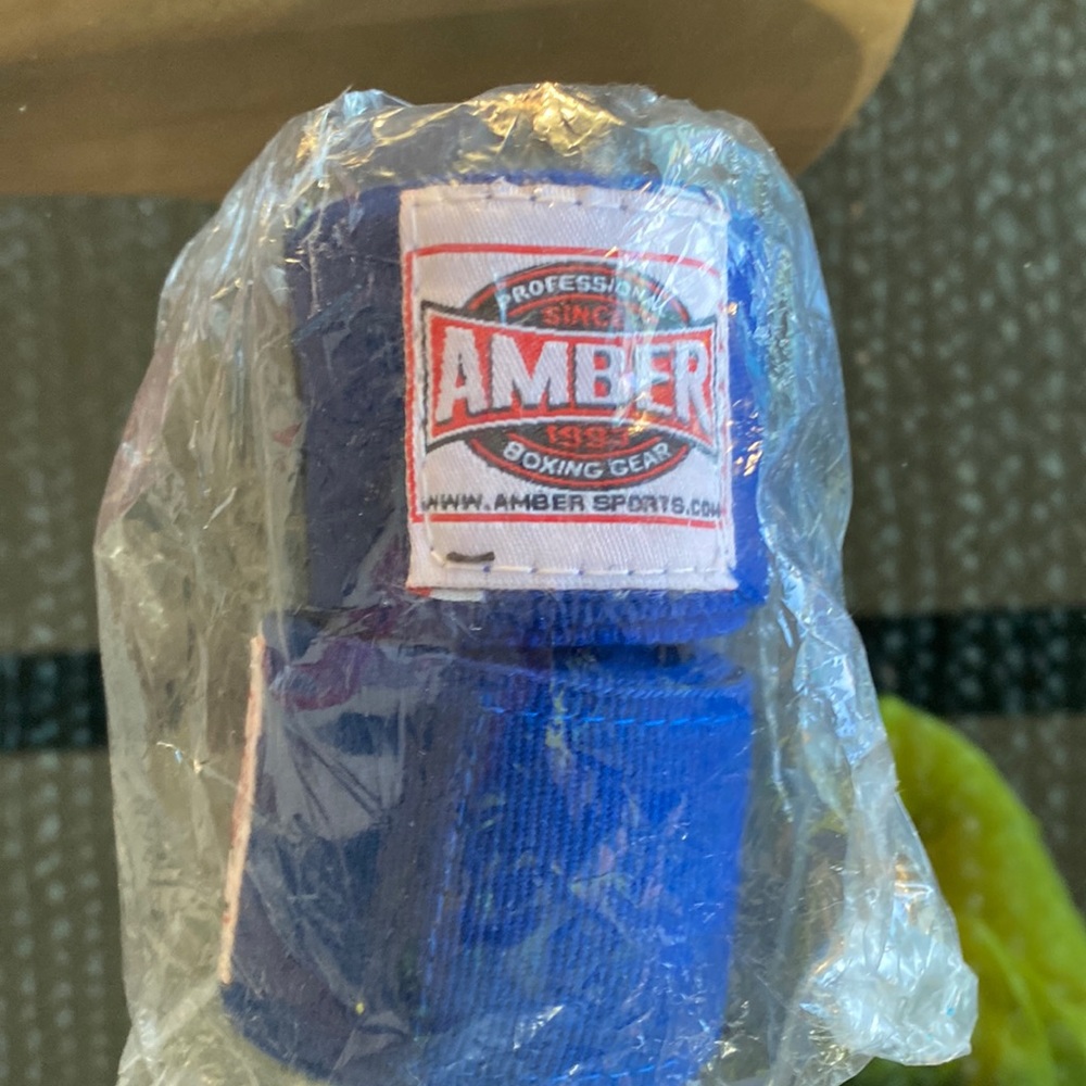 New amber boxing. Our elastic hand wraps new never opened